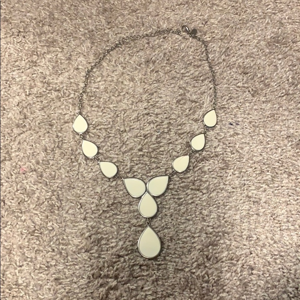 Reversible white and burnt orange necklace.